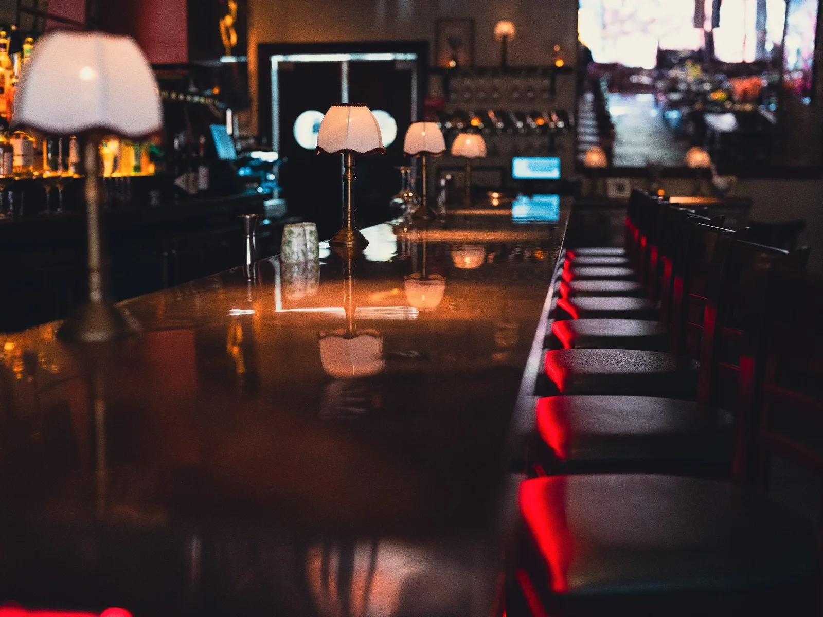 GUSI first-floor dining detail — banquette seating and textured walls in the candlelit Eastern European dining room